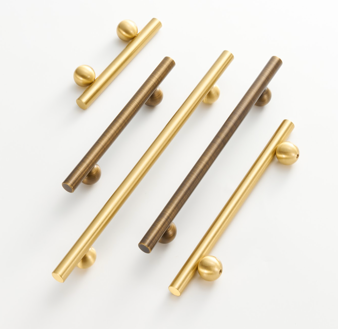 Håndtak i messing og gull